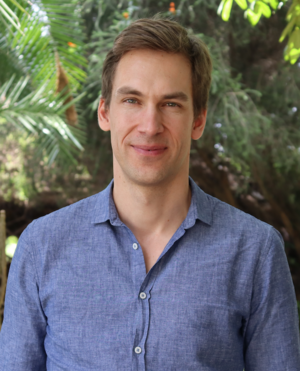 The photo shows Mr. Alexander Geiger as Director of FES TUCC