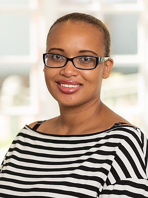 The photo shows Ms. Abnavien King as Project Coordinator
